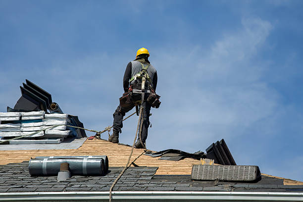 Professional Roof Replacement technician working in North Bay, NY